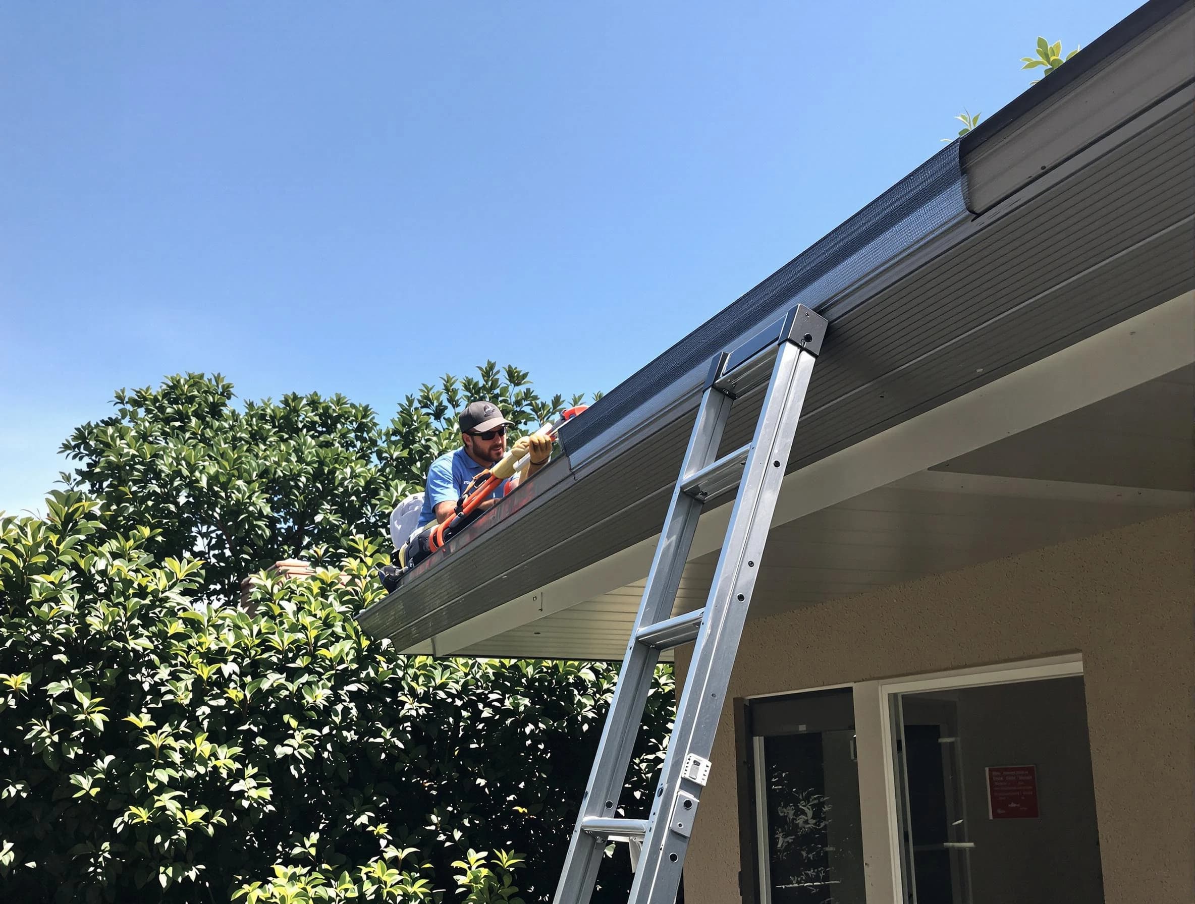 Wadsworth Roofing Company installing gutter guards for a homeowner in Wadsworth, OH